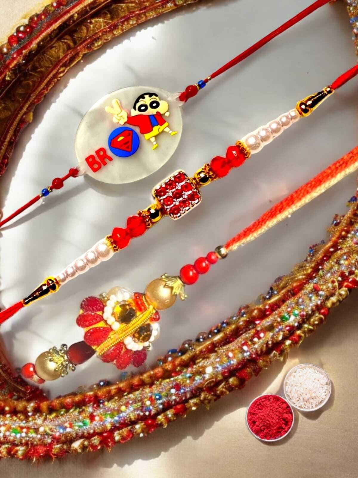 SUNINOW Bhaiya Bhabhi BBK42 Assorted Rakhi  Set (1 RAKHI FOR BROTHER, RAKHI FOR BHABHI, RAKHI FOR KIDS, ROLI)