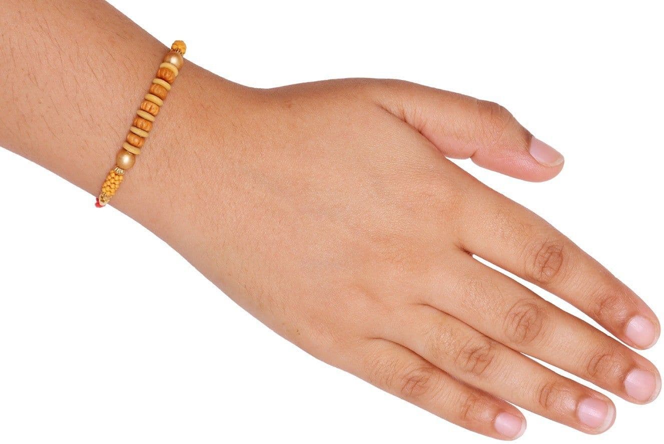 SUNINOW Designer SNPDCBR185 Sandalwood Rakhi  Set (1RAKHI, roli, chawal)