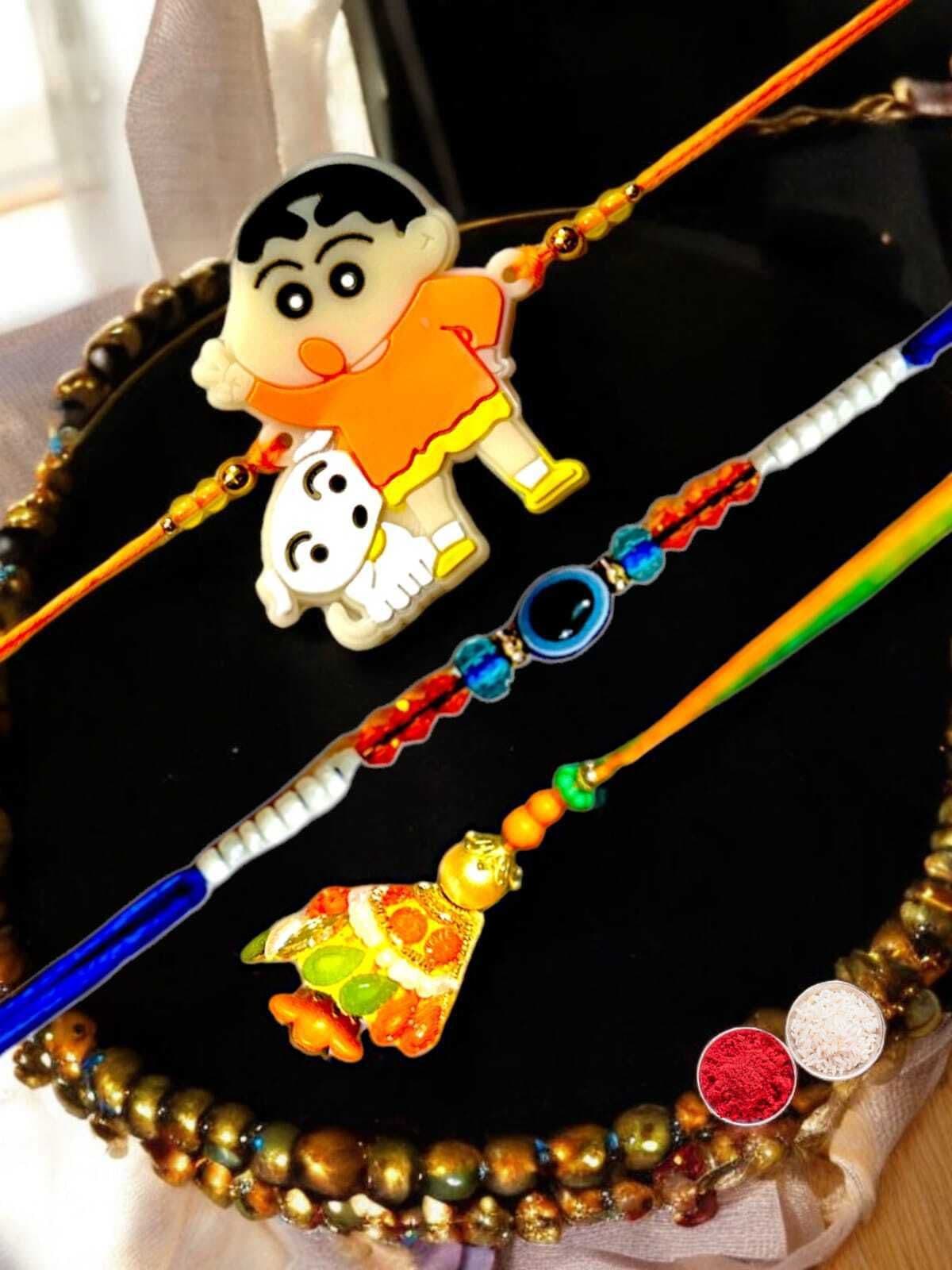 SUNINOW Bhaiya Bhabhi BBK51 Assorted Rakhi  Set (1 RAKHI FOR BROTHER, RAKHI FOR BHABHI, RAKHI FOR KIDS, ROLI)