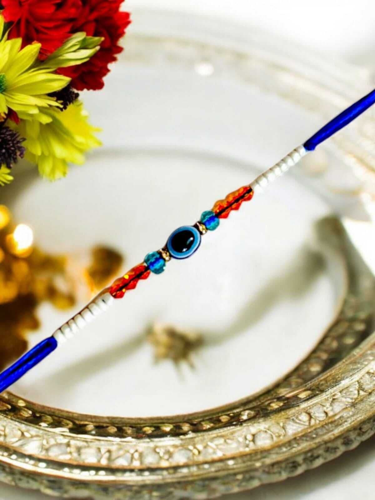 SUNINOW Bhaiya Bhabhi BBK51 Assorted Rakhi  Set (1 RAKHI FOR BROTHER, RAKHI FOR BHABHI, RAKHI FOR KIDS, ROLI)