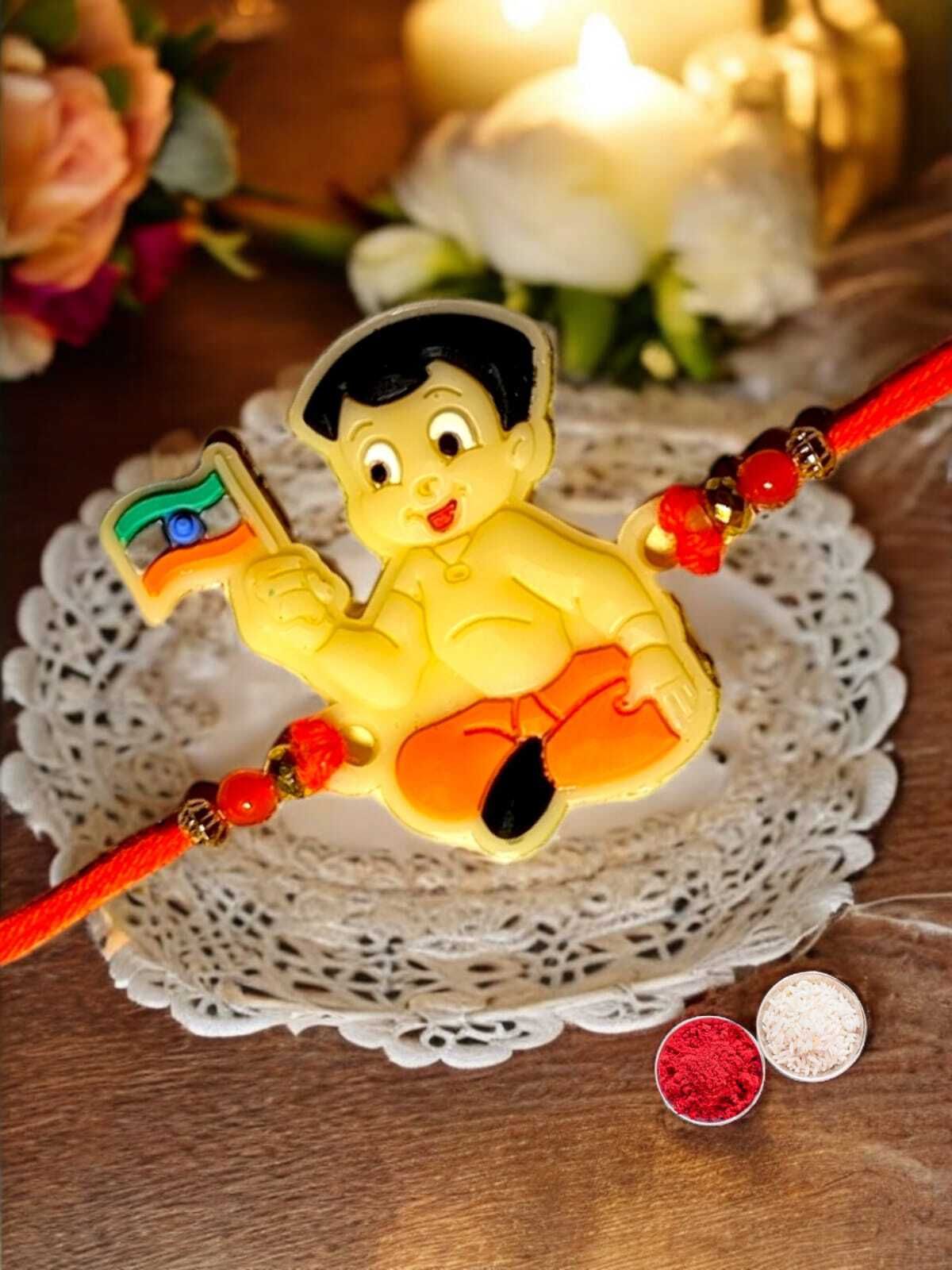 SUNINOW Kids bheem-03 Plastic (PVC) Rakhi Set (1 rakhi , 1 roli , 1 chawal)