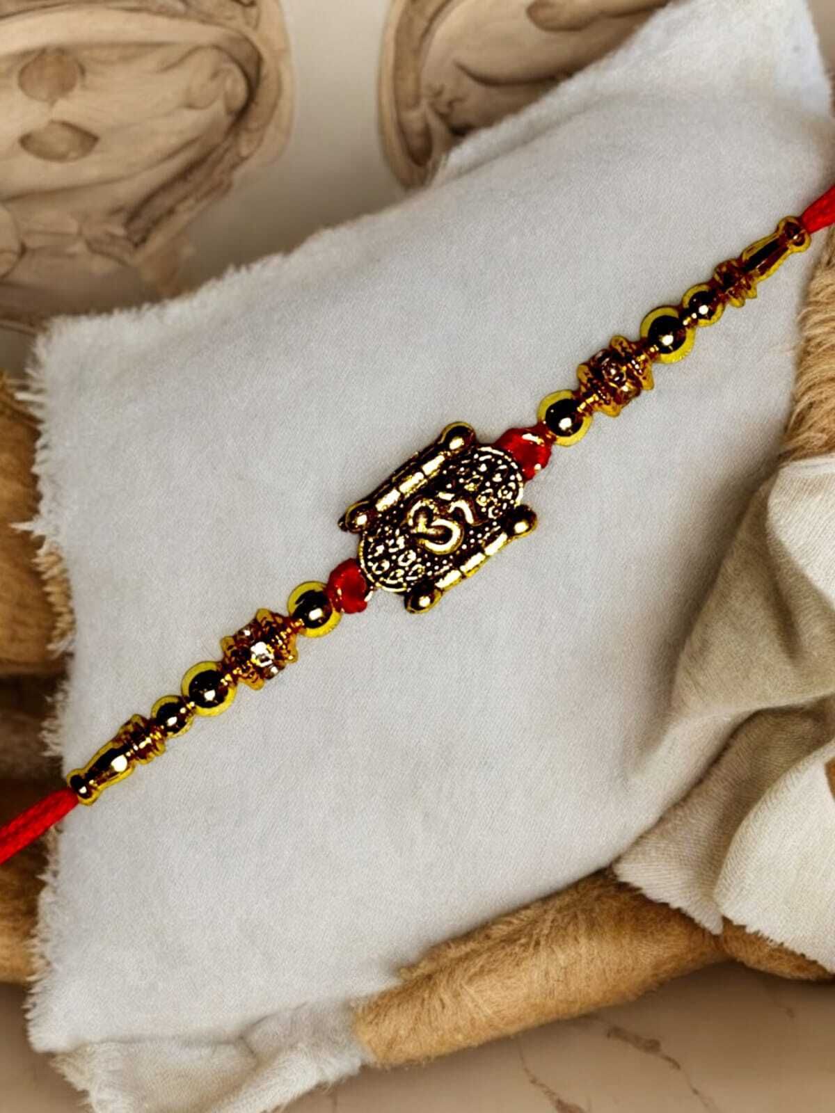 SUNINOW Religious OM-G-02 Assorted Rakhi Set (1 rakhi)
