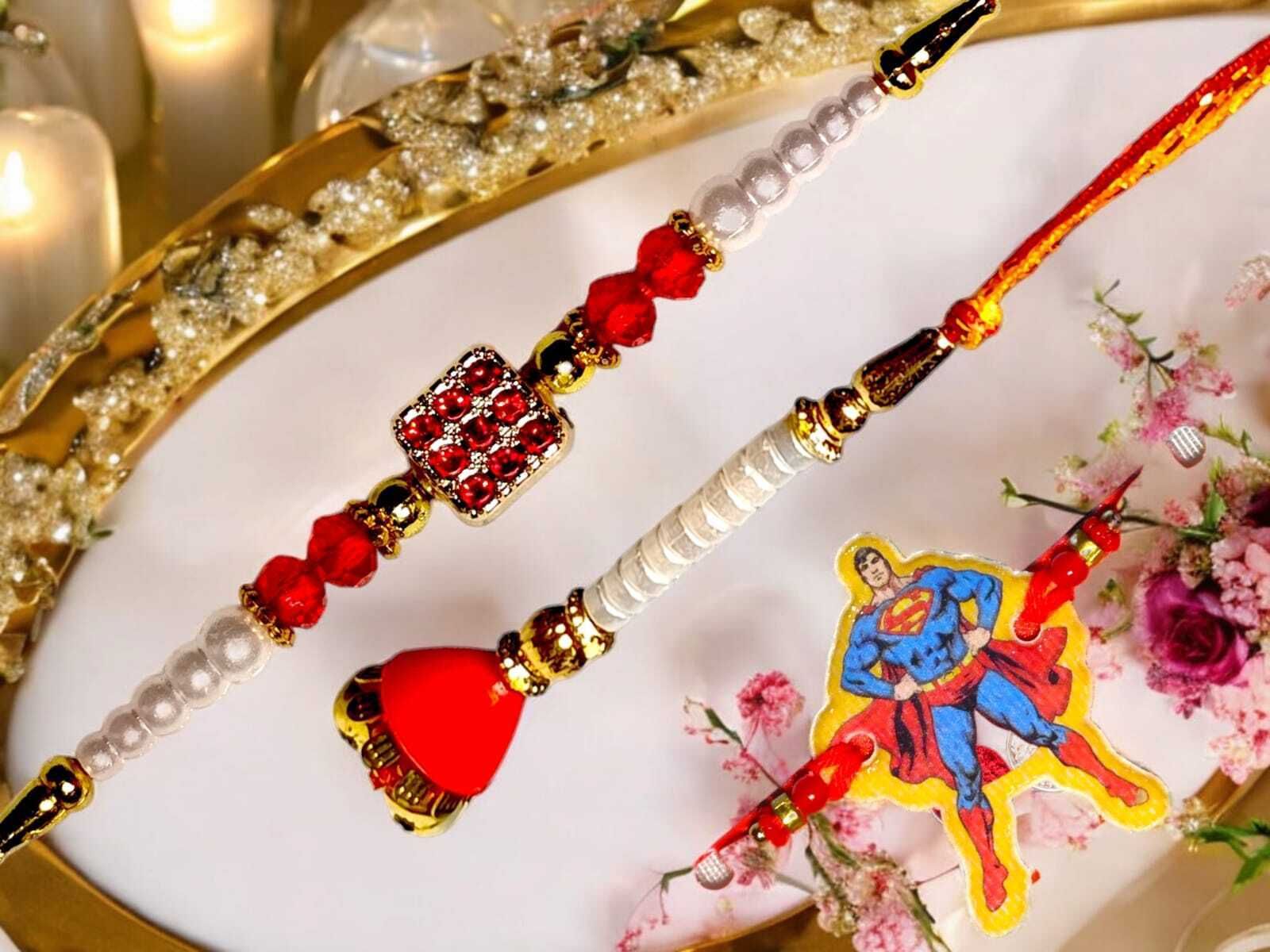 SUNINOW Bhaiya Bhabhi bbk-18 Pearl Rakhi Set (1 rakhi for brother ; 1 rakhi for bhabhi ; 1 rakhi for kids)
